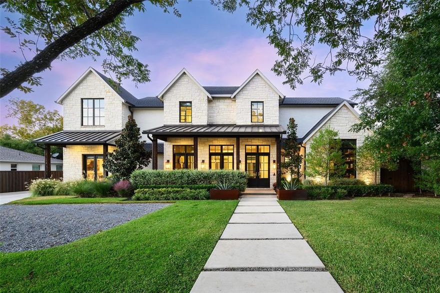 Located just one block from the prestigious Episcopal School of Dallas, this exceptional residence offers a thoughtful floor plan for everyday living with unmatched convenience. A sidewalk path leads directly from the home to ESD—letting you skip the dreaded school drop-off and pick-up lines and enjoy an effortless daily routine. Set on an expansive lot, the property features a large turfed sports field, a resort-style pool with swim jets, an attached spa, sheer-descent water features, and a motor court that doubles as a hard-surface play area striped for basketball—all framed by lush, upgraded landscaping for ultimate privacy. Thoughtfully designed and move-in ready, the home includes numerous enhancements beyond the builder’s standard: automated home systems, motorized window shades, and designer wall coverings. Filled with natural light, the open-concept floor plan showcases elegant living and dining areas anchored by a wood-burning fireplace and a gourmet kitchen with Thermador appliances and a spacious walk-in pantry. The first-floor primary suite offers a serene retreat with a sitting area overlooking the backyard, a spa-like bath, and a large custom closet with a stacked washer and dryer. A guest suite and refined office complete the main level. Seamless indoor-outdoor living unfolds with multiple covered lounging areas and a phantom-screened porch ideal for entertaining. Upstairs, find three additional bedrooms with vaulted ceilings, two full baths, a half bath, a game room, and a media room—perfect for family and guests. Energy-efficient features include spray foam insulation, a 16-SEER HVAC system, and tankless water heaters. Parking options abound with an oversized two-car garage, a one-car passthrough garage accessed via alley or gated drive, and an additional two-car parking pad. Ideally located near Downtown Dallas, Love Field, DFW Airport, NorthPark Center, and top private schools, this home combines location with luxury for effortless Dallas living.