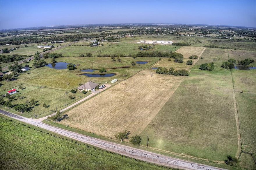 Gorgeous 10+ acre countryside escape with extensive improvements, ready for your dream home. Pastures blend with a serene creek and natural flood plain, creating the ideal balance of usability and rustic beauty. Pastures are Improved, Hay Production and Cattle Grazing. Perfect location to Build Your Dream Home. Fenced on all 4 Sides with 5 Strand Barbed Wire. The property is located in the City of Terrell and restrictions are per the city. 
 Appointments must be made to go on the property.