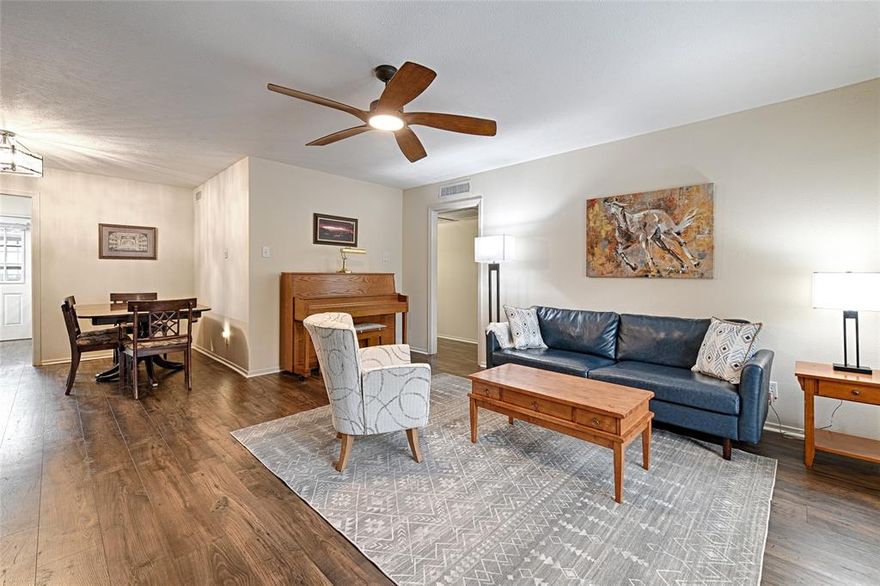 Experience easy, low-maintenance living in the heart of Dallas in this quiet, tree-lined community! EXTRAORDINARY LOCATION, near shops, restaurants, and easy highway access. 

Enter Unit D be greeted by the open living room and dining room layout that flows naturally together. Easy-maintenance, wood-look laminate flooring throughout, soft neutral paint, and natural light create a comfortable and welcoming feel, complemented by modern fans and light fixtures.

Beyond the dining space, the galley-style kitchen offers quartz countertops, shaker-style cabinetry, stainless steel appliances, subway tile backsplash, a generous pantry for added storage, and a cozy breakfast nook with additional lighting. A door off the kitchen leads to a shared balcony, leading to the courtyard and community pool, perfect for fresh air and a quiet moment outdoors.

The ample primary bedroom features laminate flooring, ceiling fan, and an extra closet with hookups for a stackable washer and dryer. If you prefer, there's also a laundry facility on-site, available to all residents. The secondary bedroom is generously sized with two closets and ceiling fan, offering flexible space for guests or a home office.

Both bathrooms retain original, classic finishes and provide functional layouts, including a tub-shower combination in the primary bath and a walk-in shower in the secondary bath.

The community offers 24-hour gated access, a perimeter fence, four swimming pools, lush landscaping, and on-site management. Monthly HOA dues cover all utilities, including water, electricity, basic cable, trash, sewer, HVAC, and building maintenance.

With its central location, practical layout, and all-inclusive HOA, Unit D offers a rare opportunity for low-maintenance living in a peaceful Preston Hollow community. Schedule a showing and see the value this home offers!