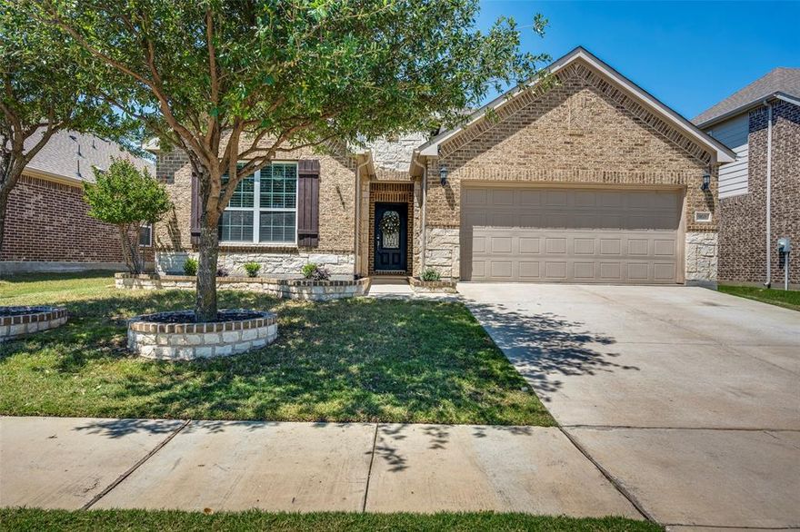 With over $125K in upgrades, this beautifully updated home in NWISD Willow Ridge subdivision stands out with luxury finishes, thoughtful design, and exceptional attention to detail throughout. This home offers the perfect blend of luxury, comfort, and functionality for modern living. Featuring 4 spacious bedrooms and 3 full bathrooms, the thoughtfully designed floorplan includes two bedrooms downstairs, ideal for a private mother-in-law suite or multigenerational living. Upstairs you’ll find two additional spacious bedrooms, a full bathroom, an oversized game room, and a dedicated media room, and the media room equipment will stay with the home. From the moment you enter, you’ll notice extensive upgrades including luxury plank vinyl flooring throughout the main areas, upgraded carpet in the bedrooms, fresh interior paint, and all new trim featuring modern 1x6 baseboards and 1x4 door casings for a clean, upscale look. The open-concept kitchen and living area feature gorgeous granite countertops, stainless steel appliances, a massive island, huge walk-in pantry, eat-in kitchen space, and a living room anchored by a stunning gas tiled fireplace with a handmade carved mantle. A separate dining room or flex space adds versatility, while the private study with French doors provides the perfect work-from-home space. The spacious primary suite offers a fully updated spa-like bath with an extended walk-in shower, standalone tub, and custom closet. All bathrooms have been tastefully updated. Additional features include a spacious laundry room with storage, a functional mudroom, and an extended patio with a covered cedar pergola, perfect for entertaining. Thoughtfully upgraded throughout, this home truly has it all.