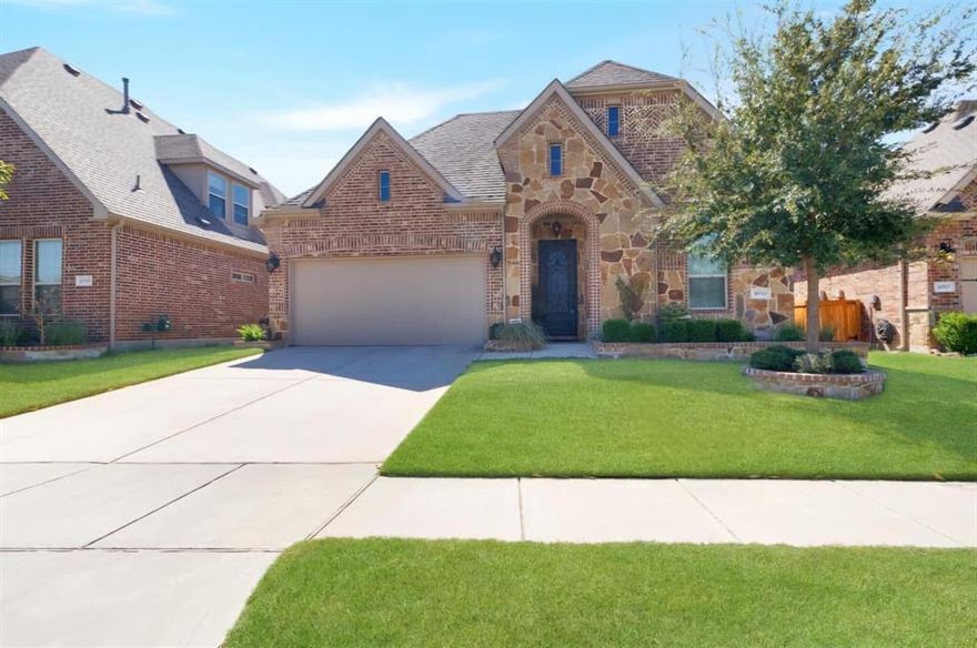 Beautifully Upgraded Single-Story Home in McKinney – Prosper ISD! Welcome to this stunning and meticulously maintained single-story residence located in the highly sought-after Reserve at Westridge community, zoned for award-winning Prosper ISD schools—just a short walk away! This elegant 3-bedroom, 2-bath home offers a functional and stylish floor plan designed for modern living. From the moment you arrive, the charming brick and stone façade, wrought iron front door, and enhanced exterior lighting create an inviting first impression. Inside, you’ll find rich wood and tile flooring, crown molding throughout, and custom plantation shutters on every window. The bright, open kitchen features stainless steel appliances, a gas cooktop with upgraded vent hood, granite countertops, and custom cabinetry, perfect for everyday cooking and entertaining alike.

The private primary suite, tucked away at the rear of the home, offers a spa-like retreat with a soaking tub, walk-in shower with built-in seating, and dual vanities with framed mirrors and upgraded fixtures. Secondary bedrooms are generously sized and include deep walk-in closets, ensuring comfort and privacy for family or guests.

Step outside to enjoy a beautifully upgraded backyard oasis featuring an extended patio with awning, ceiling fan, shade screen, and French drain system—ideal for year-round outdoor living. The lush landscaping includes fruit-bearing apple and peach trees, adding a unique touch of charm. Additional highlights include upgraded lighting and ceiling fans, modernized switchboards, and granite countertops with designer finishes in both bathrooms. With convenient access to Frisco, McKinney, and Prosper, this home delivers a perfect balance of luxury, location, and lifestyle.

Move-in ready and priced to sell—schedule your private showing today!