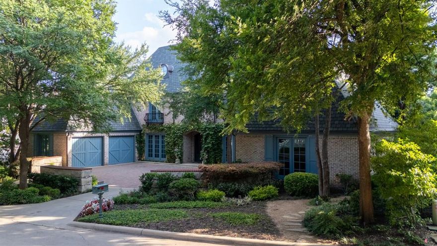 Exciting Jewel in the prestigious gated neighborhood of Lake Forest is now available! Custom built by Hawkins Welwood & designed by renowned architect Robbie Fusch. The home is sited on the most premier lot in the neighborhood & captures the beauty of this Incredible Tiered Creek Lot- everywhere you look you see NATURE! Featuring large formals, tall ceilings, an expansive great room with vaulted, beamed ceilings & newer windows. It flows seamlessly into the kitchen & breakfast room with French Doors opening to the lovely backyard. Kitchen has a large island with a prep sink, 2 dishwashers, New Gas Range (2023)  Sub Zero, & oversized pantry w silver closet. The elegant dining room has rich millwork, A Fortuny Fabric wall & butler pantry w warming drawer. Custom Bookshelves line the living room walls & features a gorgeous stone fireplace with gas logs and floor to ceiling French Window stationary doors. The sophisticated 1st Floor Primary Bedroom Suite has breathtaking views that makes one feel like they are in a luxurious treehouse! It has dual primary baths w immense Walk In Closets. Off the grand foyer is a Dramatic Circular Staircase & AN ELEVATOR. Upstairs are 3 Bedrooms all with En-suite Baths & walk in closets. An Expansive GAMEROOM upstairs has an underlet onyx countertop wet bar & large window w amazing treetop views. There is also a Tremendous Bonus Room that can function as a playroom, home office, home gym or hobby room. Covered brick patio w built in grill leads to the outdoor oasis. The backyard has unique topography with winding paths & bespoke professionally designed landscaping with stone hardscaping, turfed yard, Lentz Landscape Lighting. Other features include fresh paint in much of the downstairs, Anderson Windows, Electronic Shades, Lutron Lighting, ABUNDANCE OF STORAGE, 3 car garage. Lake Forest is a 24-7 guard-gated security, community pool, walking running trails, lakes creeks, pickleball & tennis courts, neighborhood events, clubs, & dog parks