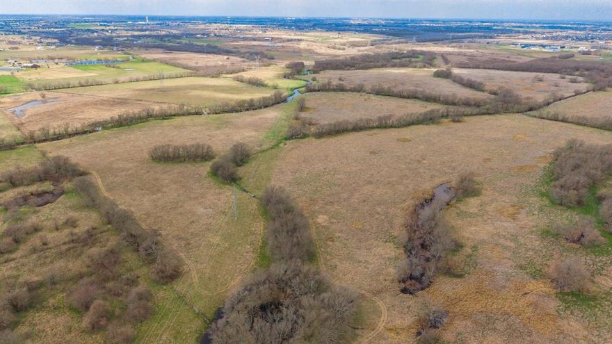 Hidden Lake Ranch at Sabine Creek is a rare opportunity to find 235 acres within Rockwall County and outside of city limits. Unique property that has potential for both recreational use and personal home sites with topography changes and 3 flowing creeks as well as prime opportunity for future development located 40 minutes to Dallas with close proximity to Hwy 276 and Hwy 30. Opportunity for industrial or commercial development as well as agricultural use or residential. A large portion of the land resides in the floodplain and seller is willing to contribute to creation of a lake to potentially recapture land to be re-assessed by FEMA. The addition of a lake would create a beautiful recreational viewpoint for a homesite as well as the potential for residential developers to utilize additional land. Property is AG exempt with Farmer's Electricity and Cash water at the southern boundary.