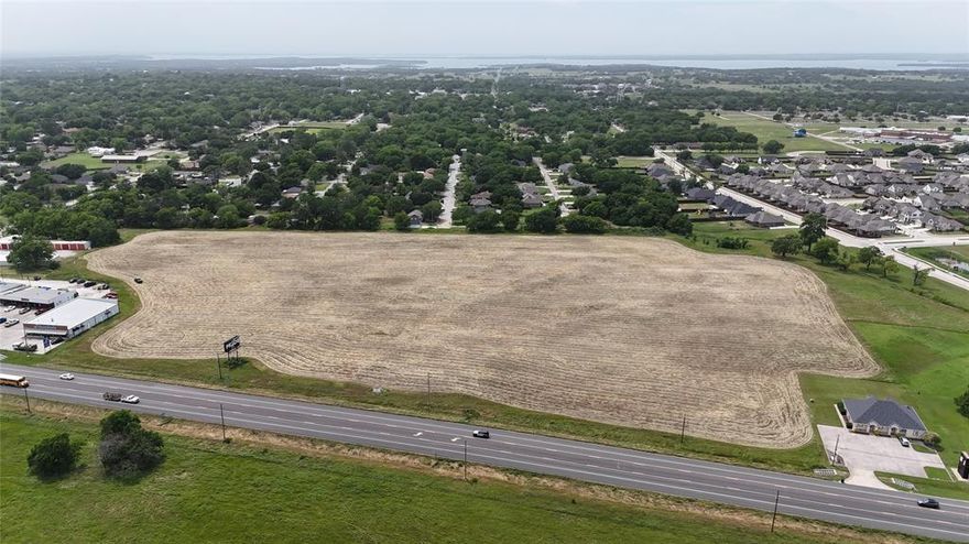 Outstanding 17-acre development tract featuring approximately 776 feet of prime frontage along Hwy 377. With the future extension of Main Street set to create a hard corner at this location, this property offers unmatched potential for commercial or mixed-use development. Main Street will provide a straight shot into historic downtown Pilot Point, enhancing visibility and accessibility. Tracts available from 1 to 17 acres, allowing flexibility for a variety of projects. Located in a high-growth area with excellent traffic exposure and strategic positioning for long-term value.

All information provided is deemed reliable but is not guaranteed and should be independently verified. Property boundaries, zoning, availability of utilities, and development potential are subject to change and must be confirmed by the buyer. Irick Real Estate and its agents make no warranties, express or implied, regarding the accuracy of this information. Prospective buyers are encouraged to conduct their own due diligence with appropriate professionals and governmental entities.
