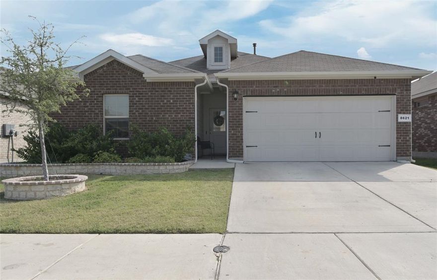 Welcome to 8621 Angel Gardens Dr. in Fort Worth, Texas and the highly-rated Eagle Mountain-Saginaw ISD!! This beautiful barely lived in home is located in the desirable Baily Park Subdivision and offers a modern open floorplan with light wood looking tile, split bedroom arrangement and 1,736 sq.ft. of fabulous living space! Perfect for families, remote workers, entertainers or even savvy investors! Sellers will negotiate in good faith! This spacious home features a light-filled living and dining area, a stylish kitchen with modern amenities, granite countertops, stainless steel appliances with gas range, white subway tiled backsplash, walk-in pantry and large seating Island. The front bedroom would make a great optional Office space, providing the perfect setting for focus and productivity. The primary bedroom has a two sink vanity, large separate shower and all bedrooms are generous sized and have walk-in closets. Separate full sized laundry room with three handy storage shelves. Step outside to the large 6 foot privacy fenced backyard and covered patio ideal for relaxing evenings, barbecues, or letting the kids and your four legged friends play feely. Tankless water heater, brick and stone raised landscaping borders, including a tree ring, sprinkler system, front and back gutters, mature landscaping and backyard children's wood playset (optional). Community amenities include a Pool with splash pad, large covered picnic area and Little Acorn Park with greenbelt walking trails and playground. Don't miss the opportunity to make this move-in ready gem yours! Call today to schedule your private showing!