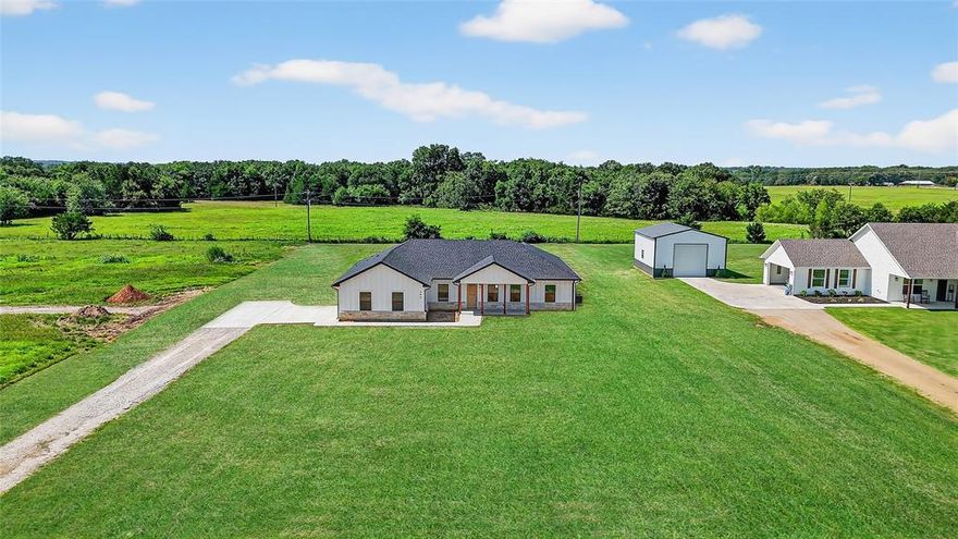 Beautiful 4 bed, 2.5 bath new construction home on an acre in the beautiful country side of Sadler Tx! This property isn’t too far from Lake Texoma, Hagerman National Wildlife Refuge, and a short drive to Sherman or Whitesboro. Picturesque windows allow for an abundance of natural light. Open kitchen and living area with island, beautiful quartz countertops with a large pantry, & large laundry room. The primary bedroom has a bathroom en-suite with dual sinks, walk in shower, soaking tub, and large walk in closet and access to the laundry room through the primary closet. 3 additional bedrooms for the whole family, or use one as an office! Spray foam for added energy efficiency. Plenty of space for front porch sittin! Covered back porch with extended patio so you can enjoy the peace and quiet! Sod coming soon. Expected completion mid July.