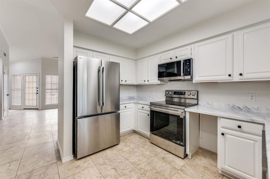 Welcome to this beautifully updated condo nestled inside a desirable gated community just off Cooper Street. From the moment you step inside, you’ll appreciate the fresh, modern feel — newly scraped ceilings (no popcorn!), fresh interior paint,
brand new flooring, and thoughtful upgrades throughout. The spacious living area features soaring vaulted ceilings and a cozy
fireplace that anchors the room! The kitchen is equipped with stainless steel appliances. A charming wet bar complete with
updated hardware is the focal point of the Living Room — ideal for entertaining or unwinding after a long day. Plenty of outdoor space on the extended balcony(extra storage closet too) as well! Enjoy access to the community pool and the convenience of being just minutes from AT&T Stadium, Globe Life Field, and UTA, dining, shopping, and the heart of Arlington. Sewer Trash Water included! Low-maintenance living in a prime location — this one truly checks all the boxes!