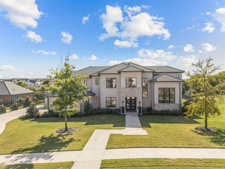 Welcome to this extraordinary custom home in the prestigious, 24-hour guarded and gated community of La Cantera at Team Ranch. Crafted with exceptional attention to detail, this home exudes quality and elegance with high-end finishes throughout. The chef’s kitchen, equipped with Thermador appliances, quartz countertops, a large center island, pass-through pantry, and separate appliance room, opens seamlessly to the living area. The living room features custom built-ins, a stunning floor-to-ceiling electric fireplace, rustic wood beams, and an adjoining wine room—perfect for entertaining.  The spacious first-floor primary suite offers luxury and comfort, while a guest suite, game room with an adjoining fitness room, private office, and expansive laundry room complete the main level. Upstairs, you’ll find three additional en-suite bedrooms, a second living area, and another fitness room. Notable additional features include a built-in dog room and an oversized 3-car garage. Outside, enjoy effortless entertaining outdoors. The outdoor living spaces include covered and open spaces, built-in grill, sink and a firepit overlooking the infinity pool, sport court, and serene, private park-like yard. This home is a true masterpiece designed for both relaxation and entertainment.