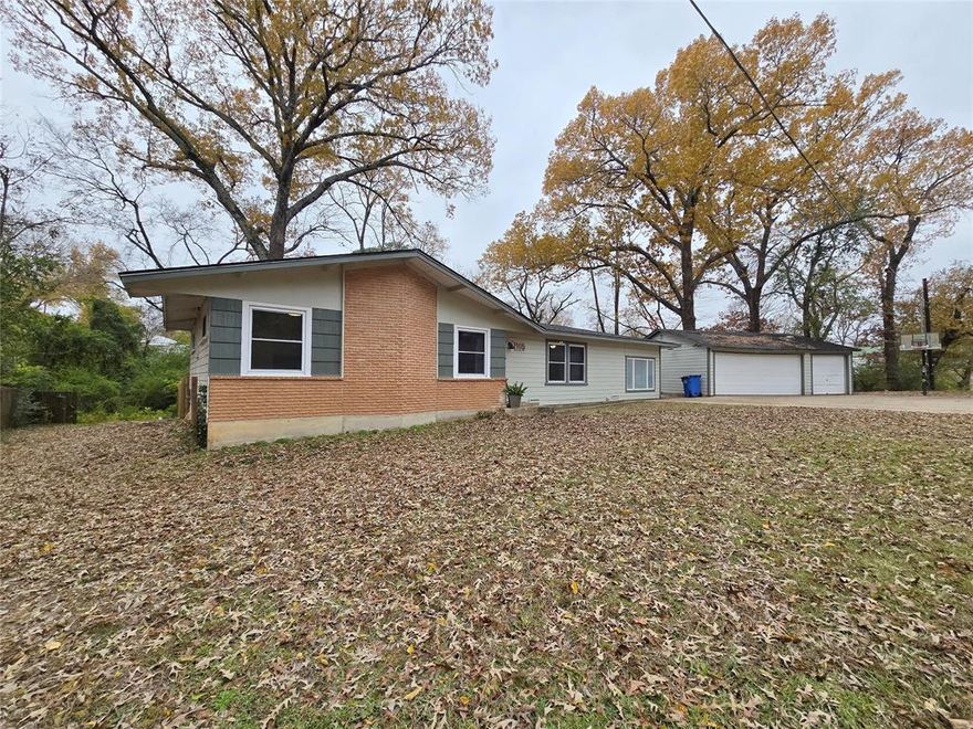 Charming 3 bedroom, 2 bath home situated on over half an acre in Grand Saline. This well-maintained property features hardwood flooring and a flexible floor plan with a second living or dining area plus a separate office or workout room. A detached 3-car garage offers plenty of space for vehicles, storage, or hobbies. The backyard includes a chicken coop and room to enjoy outdoor living, gardening, or animals. Roof is less than 5 years old, providing added peace of mind. Convenient location with small-town charm and room to spread out.