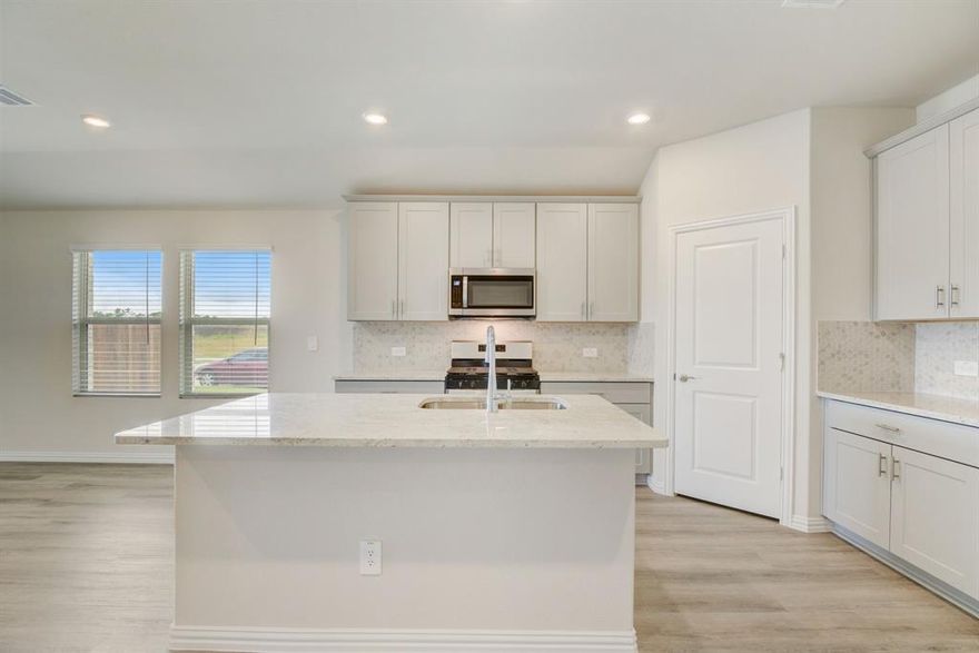 Brand new, energy-efficient home available by May 2025! Available May 1 - A private study in the Oleander makes a perfect home office or play room. Pebble cabinets with shaded grey granite countertops, brown grey EVP flooring with light grey brown carpet. Opening for sales May 1- Located in the charming city of Princeton, Windmore is only a few miles from Lavon Lake and the Historic Downtown McKinney. This community has countless amenities including a pickleball court, fitness center, pool, playground, and hiking trails. With our Closing-Ready Guarantee and Move-In Ready homes, you can enjoy all the benefits of a new home with the quick-closing timeline you thought you’d only find with used homes.  Each of our homes is built with innovative, energy-efficient features designed to help you enjoy more savings, better health, real comfort and peace of mind.