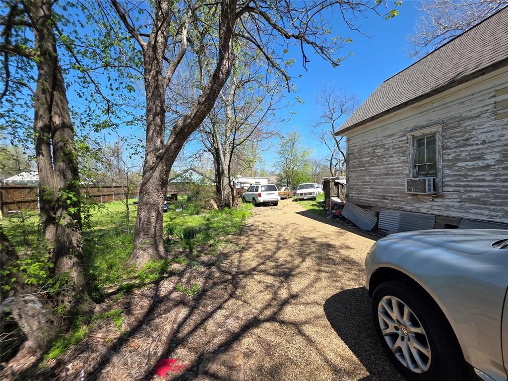 Photo of 410 W Locust Street, Whitewright, TX 75491 (MLS # 21214532)