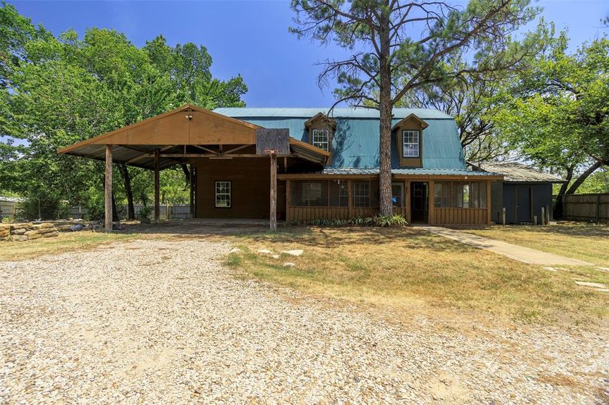 Don’t miss this unique home with almost an acre of land. Outside of city limits with no HOA!  Plenty of room to park an RV or large boat. Great access to I-20 and Downtown Weatherford. Upon entering  you will be welcomed with vaulted ceiling and a beautiful freestanding wood burning fireplace. 2 bedrooms, a full bath, study, dining and kitchen on the main floor. The 2nd floor is a loft style primary suite and features walk-in closet, dual sinks, a walk-in shower and soaking tub. Home also has a basement leading from first floor bedroom! Great opportunity for 1st time home buyers, retirees or a family to raise animals & enjoy their gardens or travel toys.