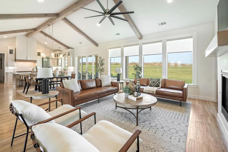 One of the largest lots in The Highlands of Northlake, positioned at the Top on 1.6 acres, this modern farmhouse delivers fewer neighbors, more privacy, and some of the best elevated sunset views in the area with true topography and space to create your dream backyard without limitations. Built in 2022 by a meticulous custom builder, every inch of this home was designed with intention and craftsmanship; no shortcuts, no compromises. Over 4,500 square feet with four bedrooms, four full baths, and three versatile bonus rooms ready to become whatever your life demands: media room, studio, playroom, or office. Three bedrooms feature private ensuite baths, while the fourth bedroom sits near a full bath off the media room, creating flexibility for guests or multi-use living. One secondary suite can function as a second primary with space for its own living area and exterior access, ideal for multigenerational living or long-term guests. Soaring ceilings anchored by exposed white oak beams set the tone the moment you walk in. The kitchen is a showpiece with quartz countertops, custom cabinetry, top-of-the-line appliances, and a layout that flows seamlessly into the main living space. Oversized picture windows flood the home with natural light. Remote-controlled shades, abundant storage, and thoughtful upgrades throughout make this home as functional as it is beautiful. The second story adds another 525 square feet, currently a hidden bonus space used as a second office and podcast studio, plus walk-in attic storage. The extended ranch-style front porch with twin swings and panoramic views is the kind of place you'll never want to leave. The backyard offers 1.6 acres of elevated privacy and potential, with pool plans available. Custom homes of this caliber take years to build, and this one is ready now. Zoned for Barksdale Middle School beginning 2026-2027. Private showings only. Contact the listing agent to schedule yours.