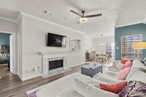 Photo of 3550 Country Square Drive #111, Carrollton, TX 75006 (MLS # 21408808)