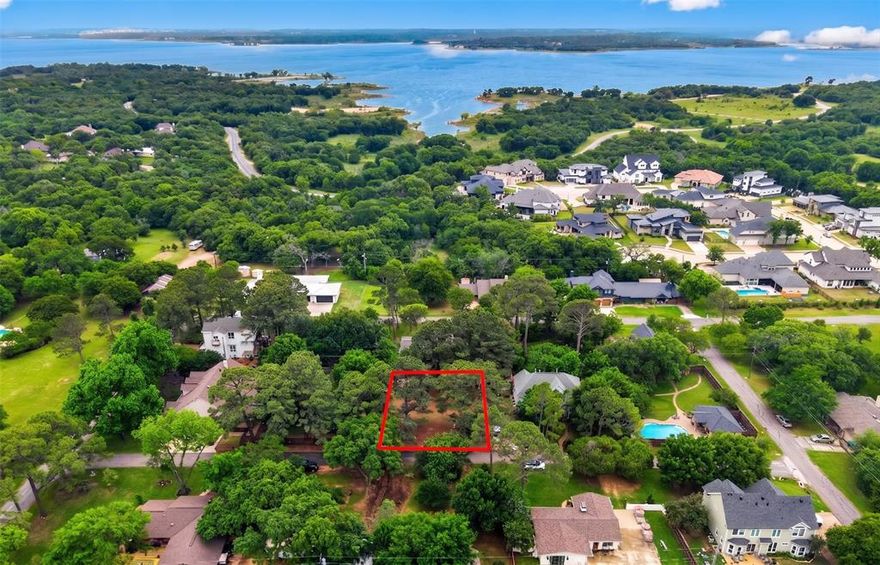 Imagine waking up to the gentle rustle of towering native oak and pine trees on your very own nearly quarter of an acre sanctuary in the heart of Flower Mound. Nestled in the established North Lake Highlands neighborhood, this level, interior lot provides the perfect canvas to bring your architectural vision to life without the constraints of an HOA. Adventure is truly at your doorstep, as you are just a short stroll away from the sparkling waters of Lake Grapevine and the renowned Northshore Trail system, perfect for morning hikes or sunset bike rides. The surrounding streetscape reflects a sophisticated blend of timeless charm and modern innovation, ensuring your new build sits perfectly within an evolving, high-end landscape. Zoned for top-rated schools like Flower Mound High, this location provides an exceptional foundation for your future. Whether you envision a contemporary masterpiece or a traditional retreat, the scattered perimeter trees provide natural privacy while leaving an open center for your ideal footprint. Do not miss this rare chance to secure one of the few remaining unimproved lots in such a prestigious, amenity-rich pocket of North Texas.