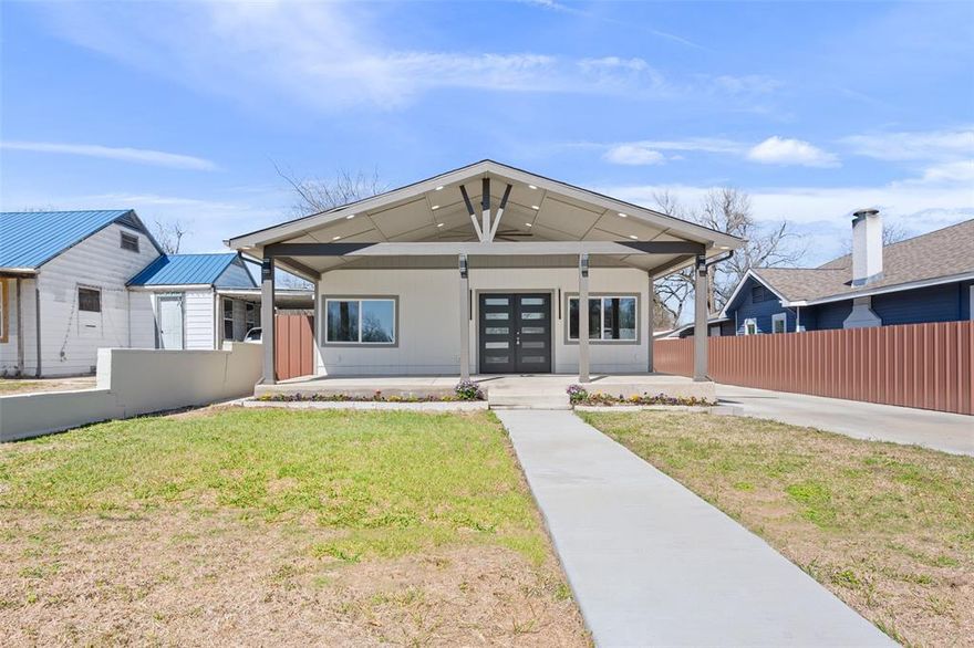 Completely rebuilt from the studs up, this beautifully reimagined home blends modern design with peace-of-mind upgrades. Every detail has been thoughtfully updated including new plumbing, new electrical, foundation improvements, spray foam insulation in walls and attic, fresh interior and exterior paint, and high-end finishes throughout. Step inside to an open-concept layout featuring luxury flooring, a sleek electric fireplace, designer lighting, and a statement front door. The fully updated kitchen offers granite countertops, custom cabinetry, modern backsplash, stainless steel appliances, and a large island perfect for entertaining. The spa-inspired bathroom showcases floor-to-ceiling tile, updated fixtures, and contemporary finishes. All appliances can convey washer, dryer, refrigerator, dishwasher, and cooktop, making this home truly move-in ready. Outside, enjoy a spacious backyard with room to entertain, garden, or create your own outdoor retreat, plus a detached garage for additional storage or workspace. This is modern living with the confidence of major system upgrades already completed, a rare find combining style, function, and long-term value.