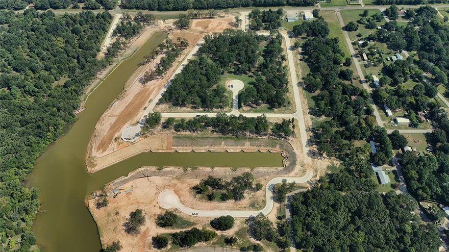 Welcome to Emerald Bay at Cedar Creek Lake! Where luxury meets natural serenity, Emerald Bay offers a remarkable community featuring only 71 exclusive homesites meticulously crafted across 44 stunning acres. Here, you can choose from both waterfront and interior homesite options, making it your chance to call this exceptional subdivision home—just over 1 hour east of downtown Dallas. Immerse yourself in a naturally inspired lake lifestyle at Emerald Bay, where your amenities embody the perfect intersection of nature and luxury. Life at Emerald Bay revolves around the refreshing waters of Cedar Creek Lake. LOT #39 ON 128' OF WATERFRONT! INQUIRE ABOUT SELLERS CONCESSION!

Amenities at Emerald Bay:
- Stunning Swimming Pool: Designed for leisure, the pool is perfect for swimming laps or lounging poolside, offering a peaceful retreat.
- Pickleball Courts: Stay active on our state-of-the-art pickleball courts.
- Basketball Courts: Shooting hoops at our well-maintained basketball courts.
- Playground: Designed for family fun and adventure. 
- Fire Pit: Enjoy cozy evenings around the fire pit, perfect for cooler nights while surrounded by the beauty of nature.
- Golf Cart Trails: Scenic golf cart paths throughout Emerald Bay, to navigate the community and connect with neighbors. 

This gated community boasts concrete roads, curb and gutter, underground utilities, street lighting, private water, private sewer, and fiber optic connections. With deed restrictions and architectural guidelines for builders, Emerald Bay is a roadmap to a luxurious lifestyle, offering both elegance and comfort. Emerald Bay is not only a stunning community but also conveniently located just a 10-minute drive away from the prestigious Pinnacle Golf Club. This 18-hole championship golf course has been voted the 8th best in Texas, making it a premier destination for golf enthusiasts.  
Being so close to Pinnacle Golf Club adds an exceptional layer to the Emerald Bay lifestyle.