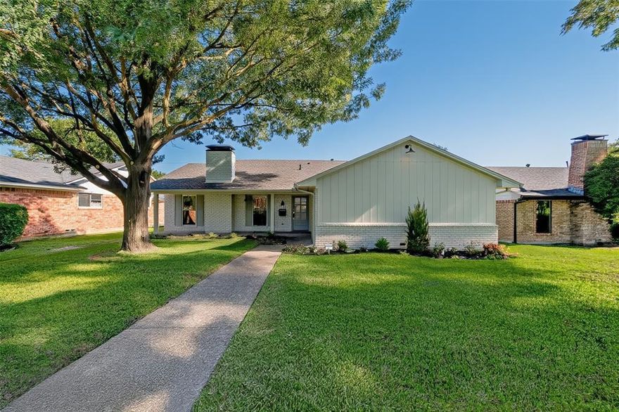 SQUARE FOOTAGE VERIFIED. LARGER THAN INITIALLY REPORTED. 2055 + 30 sq ft for Storm Shelter.

Welcome to this beautifully UPDATED and spacious 3-bedroom home feeding into Wallace Elementary (Richardson ISD). Designed for comfort and style, this home features HARDWOOD floors throughout, highlighted by a striking herringbone-patterned entryway. The open-concept layout is filled with natural light and showcases a chef-inspired kitchen complete with CUSTOM CABINETS, stainless steel appliances and an adjacent wet bar—perfect for entertaining. Each bathroom features decorative designer tile, adding personality and charm to every space. The primary suite offers a luxurious ensuite bath and a large walk-in closet, while additional bedrooms include AMPLE storage throughout. A storm SHELTER in the garage provides peace of mind, rounding out this thoughtfully designed home that blends beauty, functionality, and a premier location.

Quartzite in primary bathroom and kitchen and travertine in the wet bar