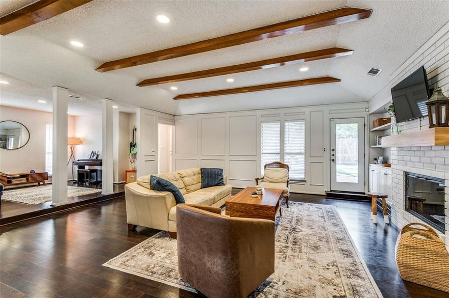 Move-in Ready! Traditional charm blended with everyday comfort in a beautifully maintained home. Featuring a warm, inviting layout filled with natural light, this property includes spacious living areas and timeless finishes throughout. The kitchen boasts classic cabinetry, ample counter space, and a cozy breakfast nook perfect for casual dining. The primary suite is a relaxing retreat with a walk-in closet and private en-suite bath. Secondary bedrooms are generously sized—ideal for family, guests, or a home office. Step outside to a large backyard with mature trees, a covered patio, and plenty of room to relax, play, or entertain. Located just minutes from River Legacy Park, this home offers easy access to scenic trails, outdoor recreation, and nature. Enjoy being in a well-established neighborhood with nearby schools, dining, shopping, and major highways. A move-in ready gem that combines traditional style with modern convenience.