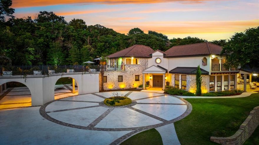 Welcome to an elegant, sophisticated world on Ridgewood Drive in Regency Park near the prestigious Country Club. This luxury Modern Mediterranean home on a 4.5-acre estate offers unparalleled grandeur and comfort, blending modern luxury with timeless Mediterranean charm.  The home boasts a stunning cast concrete free-standing outdoor staircase and fireplace.  The expansive kitchen and dining area is a culinary dream with top-tier appliances and a crescent-shaped Gaggenau cooktop. Venetian plaster walls, custom-painted and hand-stenciled designs, built-ins, a gas fireplace, and stunning light fixtures add elegance. The primary suite is a private sanctuary with grand intersecting barrel-vaulted ceilings and a recessed ceiling TV. The primary bathroom features a hand-painted cast iron bathtub, dual vanities, an oversized shower, and dual master closets.  Built on suspended concrete slabs with 156 piers and 1,200 yards of concrete, this home ensures durability and longevity.