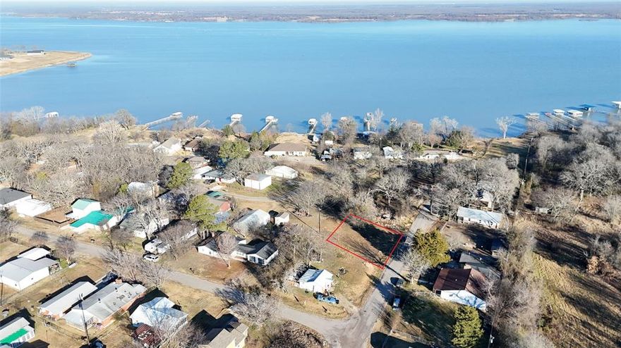 Nice lot to build new home just steps down to the lake. View of lake from property. Seller had corners of property marked by survey company. No Mobile Homes. Inside city limits of West Tawakoni. City water and city sewer provided by City of West Tawakoni. All information deemed liable. It is up to the buyer and buyer's agent to verify all information. All boundary lines on pics are approximate.