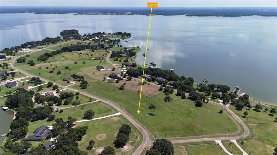 How about waking up every day to water views on both sides of your property? Yep, this 1.13-acre (49,223 sq ft) lot gives you just that with lake views front and back in the super charming Arrowhead subdivision on Richland Chambers Lake. This spot is all about lake life vibes: private boat ramp just for owners, gated entrance for peace of mind, quiet paved roads perfect for golf carts or evening strolls, and a laid-back community feel that makes it easy to call this place home. Your dream lake home with a 2,000 sq ft minimum to keep everything looking sharp. Think big things a sparkling pool for hot summer days, a cozy fire pit for s’mores nights, maybe even an outdoor kitchen for those legendary cookouts with friends and family. Bring the boat, the jet skis, kayaks, paddleboards—all the toys. This lot has the room and the views to make it all happen. And here’s the kicker—if you want more space to stretch out, adjacent lots are available, so you could literally design your own lakefront kingdom. Whether it’s your weekend getaway or your forever home, this is where you trade in traffic for sunsets, deadlines for dock time, and stress for starlit nights by the fire. Lake life is calling, are you ready to answer?