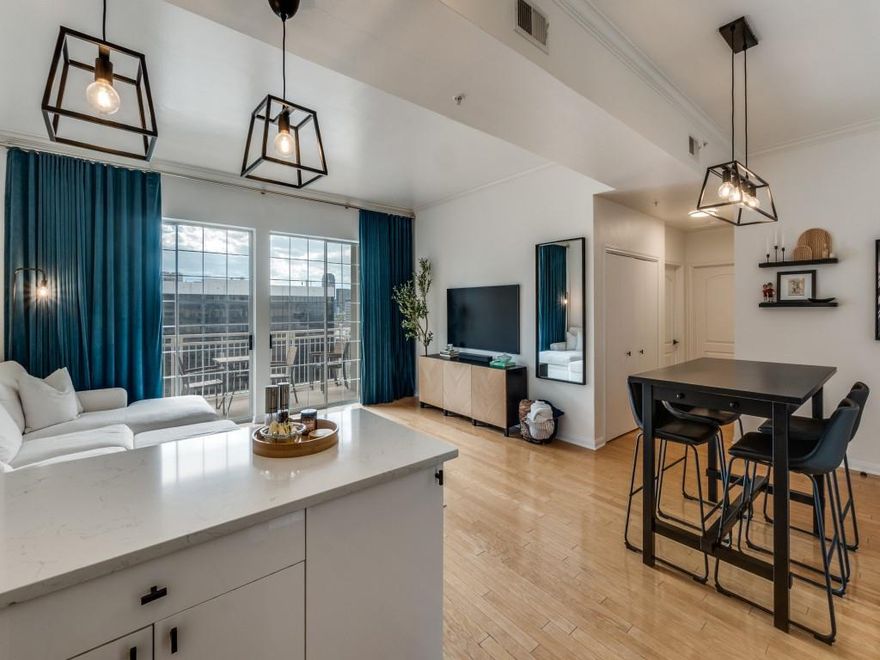 Welcome to a highly coveted Pool View unit at The Renaissance on Turtle Creek—one of the building’s larger one-bedroom floorplans, perfectly positioned to capture views of Turtle Creek Park and the Downtown Dallas skyline.

Extensively remodeled, this home features fresh paint, decorative lighting, and wood flooring throughout. The updated kitchen showcases modern custom cabinetry and upgraded appliances.

The spacious primary suite includes a built-in workspace and an oversized walk-in closet with a custom organization system. The primary bath features designer updates including updated cabinetry, wallpaper accents, and a walk-in shower.

Enjoy indoor-outdoor living on the generous private balcony overlooking the pool and park. Refrigerator, washer, and dryer convey—making this the ultimate lock-and-leave Turtle Creek lifestyle.

Resort-style amenities include two pools, 24-hour concierge with valet, two fitness centers, business centers, and guest suites. Unbeatable access to the Katy Trail, West Village, Uptown, Downtown, Oak Lawn, and the Dallas Arts District.