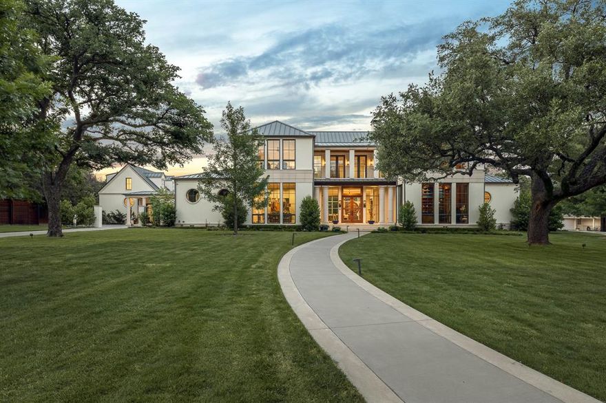 Sophisticated, transitional home on 1.13 acre lot custom-built for current owners by Cole&Co & designed by SHM in 2018. This luxurious 4bd, 4.2bth home boasts 8278sf of impeccable design & top-quality finishes, tucked away on private cul de sac in Preston Hollow. Light-filled interiors w flr to ceiling windows overlooking covered patio & expansive yard. Entry flanked by formal din & 2story study w spiral staircase to balcony overlooking outdoors. Den opens to brkfst rm, chef’s ktchn w wetbar, island, professional applncs, marble finishes, wine refrig & overlooks outside oasis. Prim suite on 1stflr w bay windows & FP. Prim bth feat sep vanities, standing tub engulfed by outdoor courtyard, 2walk-in closets & 2water closets. 1st fl also includes media rm, utility rm & two, half bths. Staircases on east & west side of home providing access to 2nd flr feat 3 ensuite bedrms & playrm. Property complete w 4car gar, guest quarters above w kitchenette & unfinished bonus space attchd to quarters.