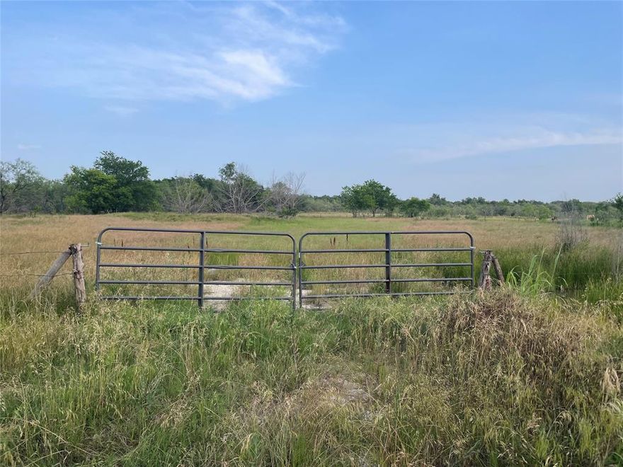 Nice unrestricted acreage right on Hwy 84, fully fenced with a nice little pond.
