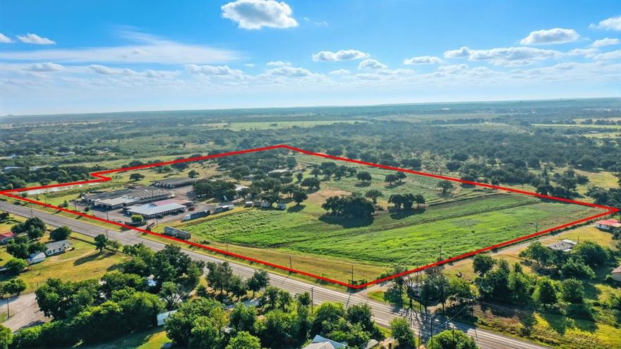A rare chance to own a part of Brown County history — Hardwick’s Farmers Market & Nursery in Early, Texas. Situated on 40 acres of prime commercial land with over a quarter of a mile of Hwy 183 frontage, this landmark property is more than just a business — it’s a destination.  Business must be purchased with sister location MLS #21043241, 100 SE 5th Street, Cross Plains, Texas 76443. The site features a approximently 10,000 sq ft retail building, over an acre of greenhouses, multiple barns and outbuildings, and even a home on site to oversee operations. Hardwick’s is a well-established brand, recognized across Central & West Texas, and has been featured on TV multiple times for its unique role as a retail, furniture, and nursery hub. This property generates revenue from many directions, including produce, furniture, partnerships, nursery items, pottery, and even alcohol sales. It also features a kitchen that is ready to be put to work, adding yet another avenue for growth. With opportunities coming in from multiple directions, your investment has more than one way to pay off. The 40 acres of commercial land provides prime real estate for future development or expansion of operations, offering endless potential for investors or operators. This listing is being sold together with MLS #21043241, 100 SE 5th Street, Cross Plains, Texas 76443. Both locations are joined as part of the offering and must be purchased together. Opportunities like this — combining a thriving business presence, extensive land, and historical significance — seldom come available in Brown County.