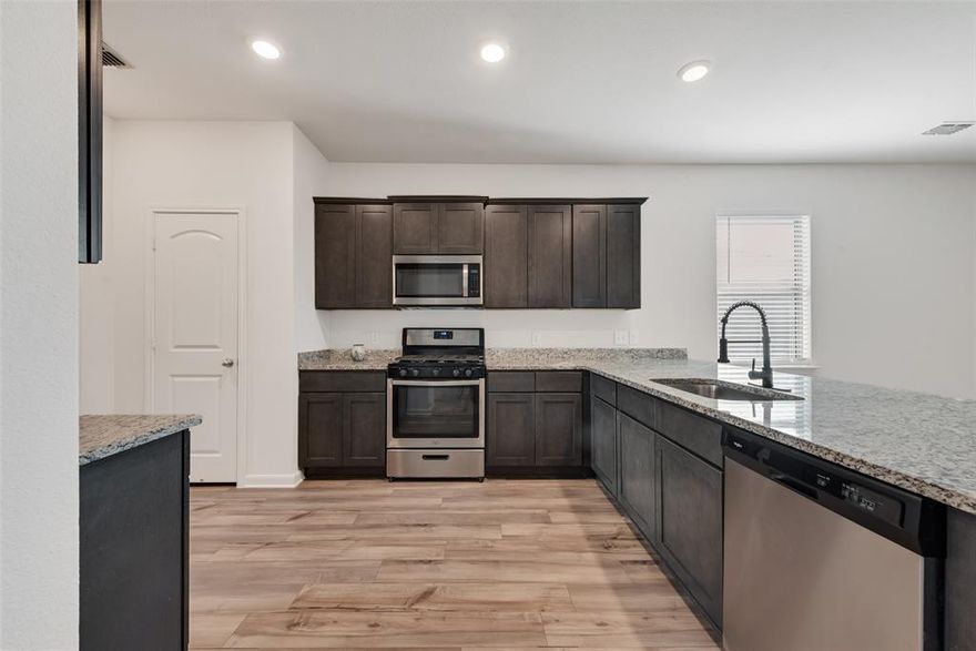 2.875% ASSUMABLE VA LOAN. MOTIVATED SELLERS! MOVE IN READY! LISTED UNDER 2024 APPRAISED VALUE!! Charming Open Concept, 3-Bedroom Home in Ponder, Texas – Krum ISD!
Welcome to this beautiful 3-bedroom, 2-bathroom home spanning 1,551 sq. ft. in the peaceful town of Ponder, Texas. Nestled in the highly sought-after Krum ISD, this home offers an ideal blend of comfort and convenience.
Step inside to an open floor plan designed for modern living, perfect for both everyday life and entertaining. The spacious living area flows seamlessly into the kitchen, which features granite countertops, ample cabinetry, and a functional layout for effortless meal prep.
The primary suite offers a private retreat with an en-suite bath, while the additional bedrooms provide flexibility for family, guests, or a home office. Outside, the backyard presents endless possibilities for outdoor enjoyment. The community includes basketball court, volleyball court, pickle ball courts, & a playground. Maple Floor Plan 1552.
Don’t miss this incredible opportunity to own a beautifully designed home in a fantastic location. Schedule your showing today!