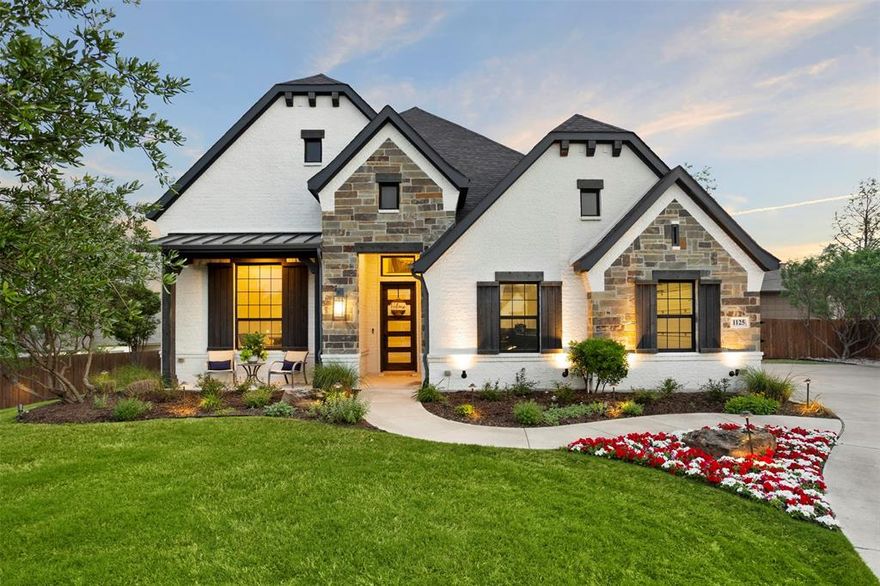 Welcome to a truly custom residence where architectural design, functionality, and luxury living converge in one of North Texas’ most desirable areas. Situated on an expansive ~0.50-acre lot, this 4-bedroom, 3-bath home offers over 3,600 square feet of thoughtfully curated living space with elevated finishes and rare, one-of-a-kind features. From the moment you enter, the home sets itself apart with a custom curved staircase, hand-troweled wall finishes, extensive crown molding, and real hardwood flooring throughout. Oversized windows flood the home with natural light, creating a bright and inviting atmosphere. The open-concept living area connects seamlessly to a chef-inspired kitchen featuring quartz countertops, double ovens, a microwave drawer, built-in wine refrigerator, custom spice storage, and a spacious walk-in pantry. Under-cabinet and display lighting add both function and style. The primary suite on the main level offers a private retreat with vaulted ceilings and a spa-like bath including a soaking tub, walk-in shower with bench seating, dual vanities, and generous storage. The custom closet features built-ins, dresser storage, and a dedicated shoe wall. Additional highlights include a front office with built-ins, oversized secondary bedrooms, a full guest suite downstairs, and an upstairs media room with a 100-inch screen, 4K projector, and surround sound. Step outside to a resort-style backyard with a covered patio, fireplace, built-in audio, and outdoor kitchen with grill and Green Egg. The custom pool and spa feature an infinity-edge hot tub, volleyball layout, seating ledges, and upgraded equipment with WiFi connectivity. The deep, tiered lot provides added privacy and space. Additional features include a 3-car garage with EV Level 2 charger, smart thermostats, dual HVAC systems, built-in storage, and whole-home audio wiring. Located near 287, 35W, and the greater DFW area, this home offers a rare blend of privacy, luxury, and accessibility.