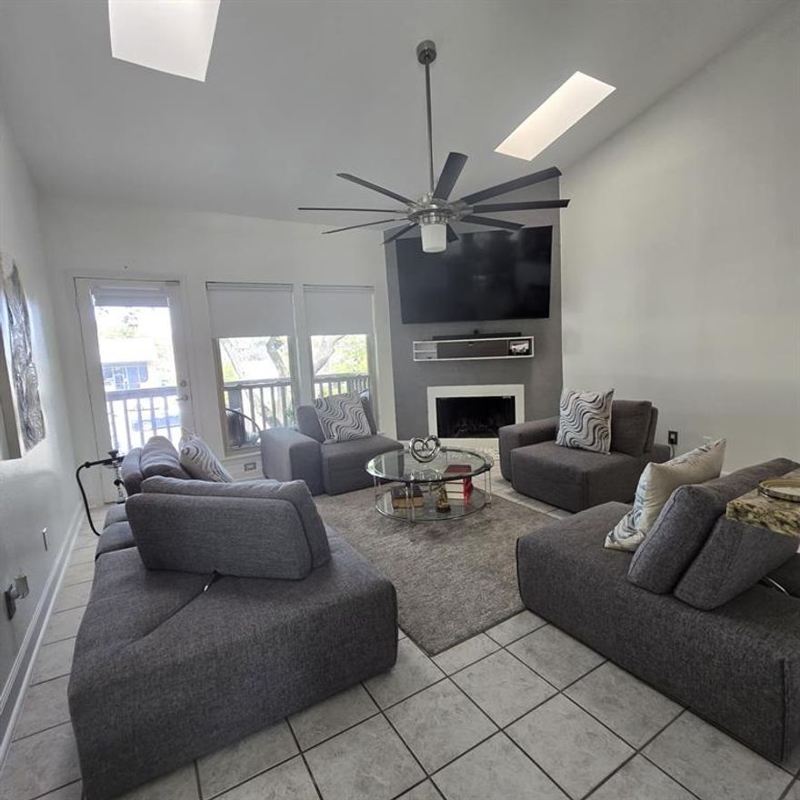 This well-maintained condo offers a community pool and beautifully landscaped common areas. Interior features include ceramic tile flooring, Berber carpet in the bedrooms, and laminate wood flooring on the staircase. The living area is warm and inviting with a wood-burning fireplace, vaulted ceiling, skylight, and ceiling fan.
The split-bedroom layout provides added privacy. The primary suite includes two walk-in closets and access to a private balcony. Washer, dryer, and refrigerator are negotiable non-realty items.