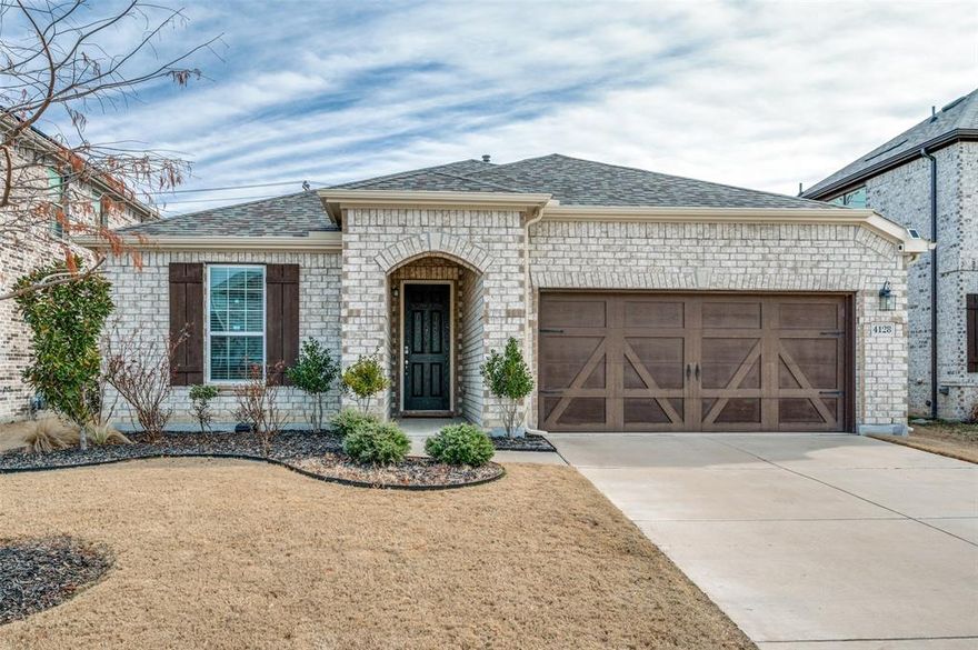 Welcome to this move-in ready, WEST-facing home in the heart of award-winning Prosper ISD, zoned for Smothermon Elementary, Moseley Middle School, and Richland High School.Bright and open, this home is filled with natural light and features LVP flooring throughout the main areas for durability and easy care. The open-concept layout connects the kitchen, dining, and living spaces so everyone can stay connected — whether you’re cooking dinner, helping with homework, or enjoying movie night together.The modern kitchen  offers white 42 in cabinets, ample granite countertops, a large island, and a walk-in pantry for extra storage.Three well-sized bedrooms at the front of the home provide flexible space for kids, guests, or a home office, while the private primary suite overlooks the backyard. Each room comes with SRS surround electric outlets to support today’s connected lifestyle.You’ll appreciate thoughtful upgrades like:Smart locks with keyless entry for peace of mind,Upgraded lighting and ceiling fans throughout,Tray ceilings adding a touch of style to the living and primary bedrooms,Tesla electric vehicle charger,Three-stage reverse osmosis water system,Updated toilets and fixtures,Gutters around the full roofline,Freshly painted garage with new baseboards,Professional sealing to protect against pests,Step outside to your private brick-fenced backyard, complete with an extended concrete patio — the perfect spot for weekend BBQs, playtime, or unwinding after a long day.Enjoy quick access to Frontier Parkway and the Dallas North Tollway extension, just minutes away from parks, shopping including H-E-B and Costco, and the exciting Prosper Arts District. Fun family outings are always close by — even the Universal Kids Resort is less than 15 minutes away.Your family will love the community amenities, featuring two pools, a fitness clubhouse, tennis and basketball courts, scenic lakes, and a dog park for your furry family members.