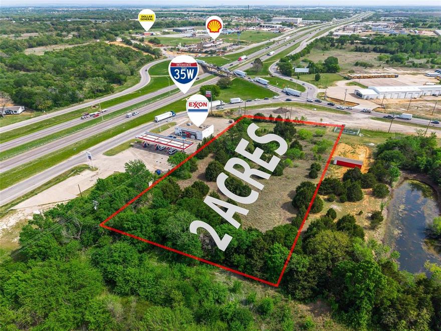 Rarely does a 2-acre parcel combine such raw potential with a strategic location on one of the region's most critical transit arteries. This unimproved lot, situated directly by I-35 West. The city has already designated the property in its future land-use map for commercial development, while it currently maintains agricultural zoning for favorable tax status.

This foresight by the city makes it a prime candidate for various high-impact uses, from retail and hospitality to professional office space or light industrial facilities. Thousands of daily commuters provide built-in marketing through massive highway visibility, while the surrounding infrastructure continues to evolve to meet rising demand. The site is a clean slate in a high-demand corridor, ready for a visionary to take it from a quiet lot to a bustling commercial landmark. Whether you are looking to land bank for future gains or initiate a flagship project, this property offers the scale, location, and municipal alignment to ensure long-term success. Secure your foothold in this booming corridor today.