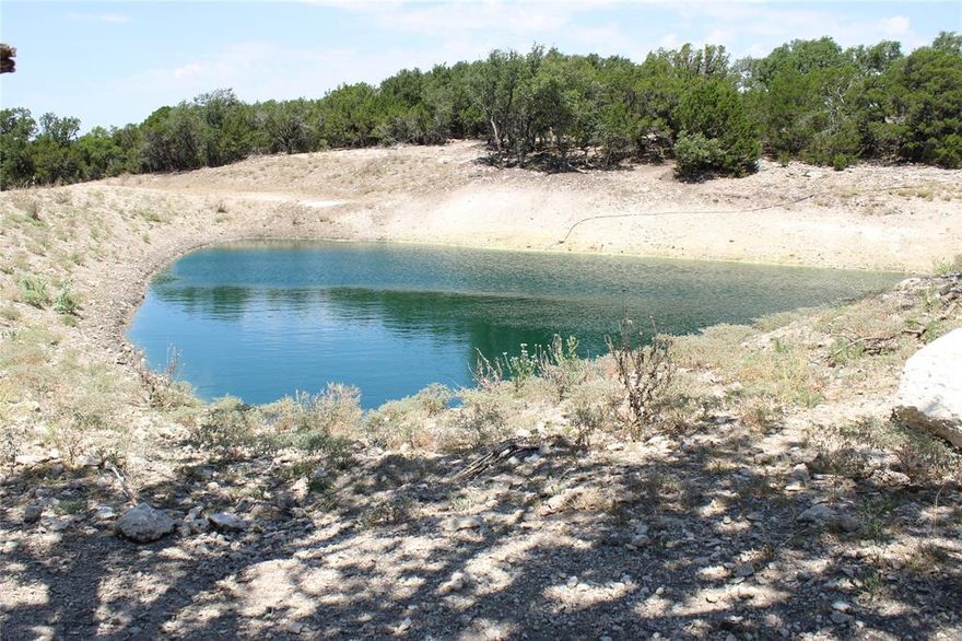 Nestled among the hills southeast of Abilene, east of Tuscola, lies this 631 high fenced acre property with phenomenal views to the north, west, and south. The property has been stocked with whitetails. Sorry, no exotics. The vegetation includes native grasses, a wheat field, live oaks, cedar, shinnery, and other native plants. Terrain is undulating with over 60 feet in elevation changes. There are 3 water wells, all on solar, believed to be around 300 feet deep, plus or minus. There are 3 tanks but only one of them currently has water in it. Plenty of quality roads throughout. All feeders and blinds will convey. No mineral production.