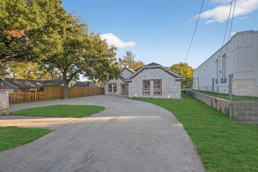 Beautiful 2006 built home offering 4 bd 2 full bath and 2,184 sq ft of spacious living! This well-maintained property features 2 living areas, perfect for entertaining or creating a separate flex space. The big kitchen is a true standout with marble countertops, a commercial grade stove, ample cabinetry, and plenty of room for gathering. Enjoy cozy evenings by the fireplace and take advantage of the built-in bar area ideal for hosting family and friends. Recent updates include flooring, carpet, fresh paint, a fence and a HVAC system for added comfort and peace of mind. The circular driveway in the front adds curb appeal. The primary bedroom offers a relaxing retreat with a garden tub, separate stand-up shower, and walk-in closet. A separate utility room with a sink adds convenience and functionality. With its generous layout, major system upgrades, stylish finishes, and thoughtful design, this move-in ready home offers both comfort and value.