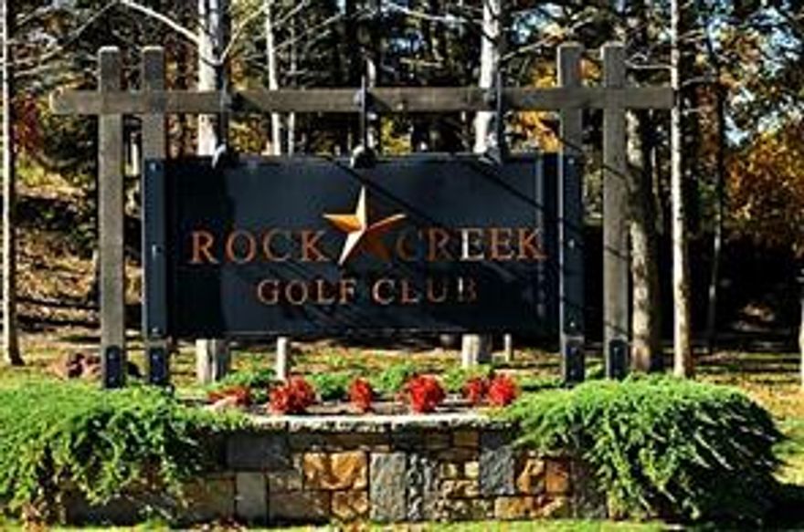 Beautiful Rock Creek Resort property in the Muirfield Addition. Land backs to a ranch with a creek separating it, providing buffer from other properties. This resort is a master-planned, gated community located on the TX shores of Lake Texoma, approx 60 min north of DFW metroplex. Built around a beautiful Jack Nicklaus designed golf course, property ownership gives you access to all amenities and includes GOLF membership.  There is NO TIME LIMIT TO BUILD.  Resort includes Restaurant, Golf Shop, Marina, Ship Store, Pool, Fitness Center (almost ready) and more! The community combines the best of lakeside living with the amenities of an upscale resort. It's a golfing, fishing and boating paradise!