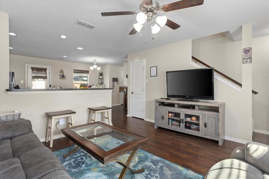 Welcome to this spacious 3-bedroom, 2.5-bath home offering comfort, convenience, and a flexible floor plan for everyday living. The open-concept main level features a large living area that flows easily into the kitchen with a raised breakfast bar and eat-in dining space—perfect for entertaining or relaxing at home. Upstairs, a generous loft provides additional living space, ideal for a home office, media room, or play area. The primary suite includes an ensuite bath with dual sinks, a separate shower, and a walk-in closet. Outside, a large fenced backyard offers plenty of room to enjoy the outdoors. Located in a quiet neighborhood with quick access to schools, shopping, dining, and major highways, this home offers excellent value and opportunity in a convenient Fort Worth location.