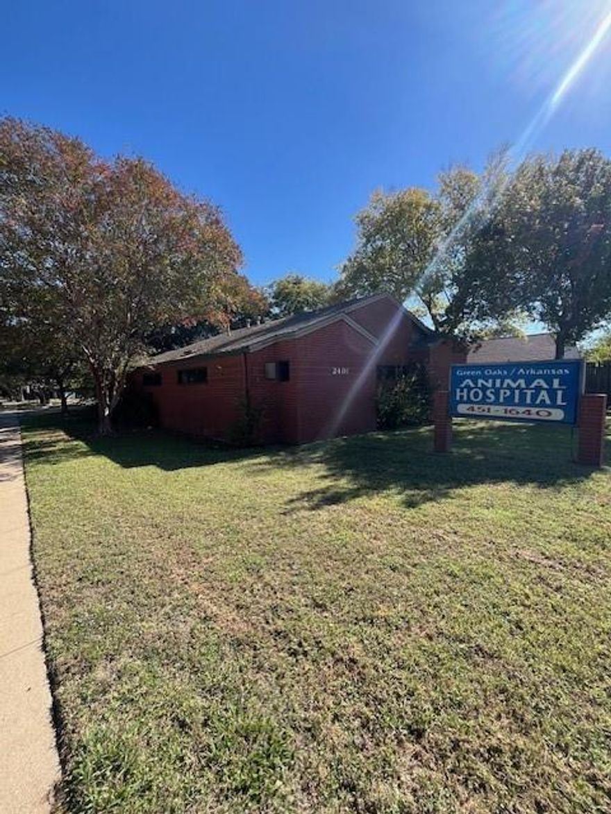 Veterinary clinic on the corner of W Green Oaks Blvd and Napier Dr.  2300 square foot building includes 3 exam rooms, grooming room, x-ray room with black room, surgery room, kennel room, vet tech area, waiting room, and 2 restrooms.  Building is also setup with oxygen drop lines.  Property has a large parking area in the back.  Building has foundation issues which have been considered in the asking price, owners are selling as is.
