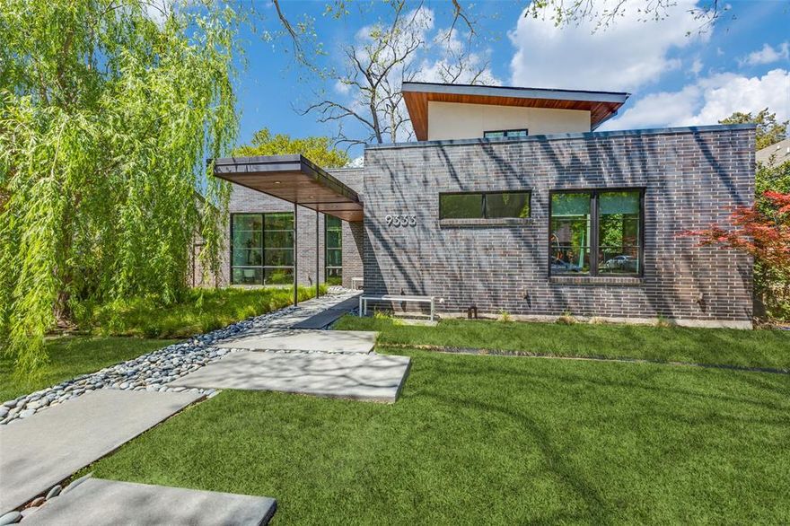 Just one block from White Rock Lake, and designed by acclaimed architect Douglas Hildinger, this custom-built, Contemporary residence is a modern marvel. With clean architectural lines and impeccable design, this 5-bedroom, 5.1-bathroom home offers lake-adjacent living at its finest.

Inside, you'll find high-end lighting by Artemide and Driade, along with custom art lighting by Douglas Architectural Lighting. The sleek Italian Valcucine kitchen—curated by Pohlenz Cucine Moderne—sets the tone for luxury, while powder rooms by Porcelanosa add refined European style.

Enter this wonderful home to an open floor plan, and walls of windows. The first floor has two bedrooms, each with their own private bath. The living area and kitchen center around views of the backyard oasis. Additional first floor features are mud area and attached, oversized garage with closet, 300-bottle wine fridge and electric car charger.

The second floor has three bedrooms and two living areas. The gorgeous primary suite has a sitting area, two walk-in closets and balcony. The en suite bathroom has dual sinks, and frameless glass shower.

The current owners have enhanced the outdoor living experience with the addition of a beautifully designed pool with automatic pool cover, perfect for relaxation or entertaining. The home includes Ring doorbell and security, seven zone Sonos sound system and Lutron lighting system, which provides smart, effortless control of the environment, and level 4 museum-finish walls throughout add a gallery-like touch. The energy-efficient 2-phase HVAC system ensures comfort year-round.

This architectural gem combines modern sophistication, luxury finishes, and an unbeatable location near one of Dallas’ most treasured natural landmarks.