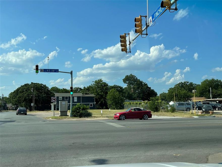 Corner lot, right at the traffic light, lot of potential. Please contact city for zoning.