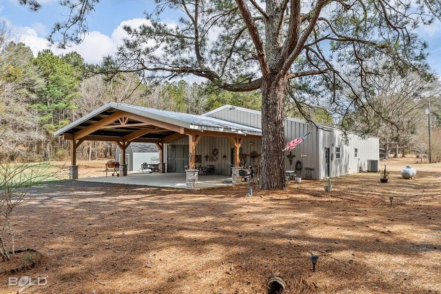 Nestled on 5.898 acres in Minden, this charming 2-bedroom, 2-bath home offers the perfect blend of country living and modern convenience. Its open layout creates a spacious feel, with abundant natural light enhancing the inviting atmosphere. The well-appointed kitchen features a butler pantry and flows seamlessly into the dining and living areas, making it ideal for entertaining. The primary suite boasts a walk-in closet and a luxurious en-suite bathroom complete with a classic clawfoot tub and a separate shower. The second bedroom provides flexibility for guests or hobbies, while two dedicated offices offer the perfect setup for remote work or creative spaces. Outside, the expansive acreage invites endless possibilities, from gardening and outdoor recreation to future expansions. Additionally, the property includes a spray foam insulated shop, providing excellent climate control and energy efficiency for projects or storage. Whether you're seeking a peaceful retreat or a functional home with ample space, this property delivers a rare combination of tranquility and convenience in the heart of Minden.