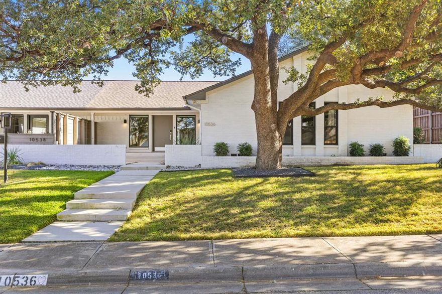 Located in sought-after Crest Meadow Estates, this updated 3-bedroom, 4-bath home offers an easy, elevated lifestyle in one of Dallas’ most desirable neighborhoods. Thoughtfully designed for both privacy and entertaining, the home centers around a resort-style pool that has been recently renovated and features heating and cooling for year-round enjoyment. Clean hardscaping and low-maintenance turf make the outdoor space feel effortless—perfect for hosting or unwinding. Inside, the home feels bright and open, with white oak hardwoods throughout the main living areas and into the primary suite. The main living room features vaulted ceilings and a fireplace, creating a comfortable, inviting space to gather. The living and kitchen areas open into a private interior courtyard. The kitchen flows seamlessly into the dining and living areas and includes stone countertops, premium appliances, and a layout that works equally well for everyday living and entertaining. The primary suite is a peaceful retreat with two walk-in closets and a spa-like bathroom featuring a soaking tub and thoughtfully selected finishes. A separate office provides a quiet place to work, while a second living area or bonus room includes a wet bar and built-in wine fridge—ideal for movie nights or hosting friends. Additional highlights include a two-car garage with an EVO charging station, backup power for the alarm and garage door, and a private side yard. With no HOA, you’ll enjoy the freedom to truly make the home your own. Just minutes from walking trails, great dining, upscale shopping, and both Love Field and DFW, this home offers comfort, convenience, and style in a prime Dallas location.