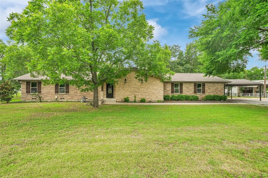 Welcome to your dream escape complete with 3.22 acres! This expansive property is perfect for your hobbies, farm-to-table gardening, or simply enjoying tranquil living. Indulge in the designer kitchen with chef's grade stainless steel appliances, including a 6-burner gas range, double ovens, and a wine fridge. The spacious living area stuns with exposed wood beams and a stone fireplace, while adjoining flex space offers panoramic and stunning views. The luxurious master bath features exquisite basket-weave and micro tile designs, and the deluxe utility room includes a wash tub sink, quartz counter, and half bath. Outside, enjoy tiered decks, a custom patio, sheds, 4 powered storage bays, a workshop, deluxe dog run, and 6 covered parking spaces. This property is a canvas for your lifestyle dreams!