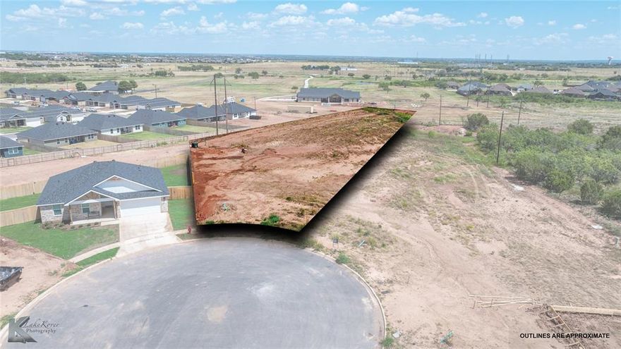 This is the larger lot that is PERFECT for a custom home and back yard extras, at end of the cul-de-sac. Agent sign on the property. Beautiful sunrises and sunsets.