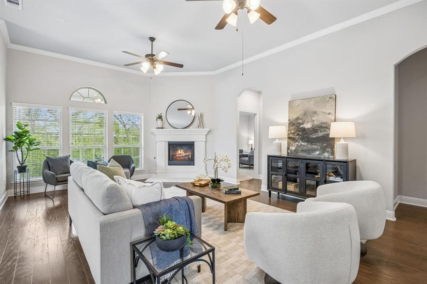 Tucked into one of the most desirable pockets of Willow Wood, this home offers a level of privacy and everyday living that is hard to find and even harder to leave. With open space beside you and a peaceful, tree-lined backdrop behind, the setting feels quiet, protected, and removed from the typical neighborhood experience - where your mornings start with sunlight and stillness instead of rooftops and fences. Life here flows with ease. The layout creates a natural rhythm between connection and retreat, providing dedicated areas for everyone while still bringing people together at the heart of the home. Whether it is slow mornings, relaxed evenings, or hosting guests, every space feels intentional and comfortable. Step outside and the lifestyle expands. Enjoy weekends at the community pool and splash park, afternoons at the playground, and evenings walking scenic trails that wind through the neighborhood. It is the kind of community where neighbors connect and everyday moments turn into lasting memories. Beyond the neighborhood, you are positioned in one of North Texas fastest-growing areas, with quick access to shopping, dining, and major routes that make commuting simple while keeping you close to everything that matters. Homes like this do not come up often - not just because of the structure, but because of how it makes you feel the moment you arrive. If you have been waiting for a residence that offers more than just a house, this is where your next chapter begins. 
Highlights Include: Corner Lot - Greenbelt View - Smart Home - High Speed Wiring - 3 Car garage