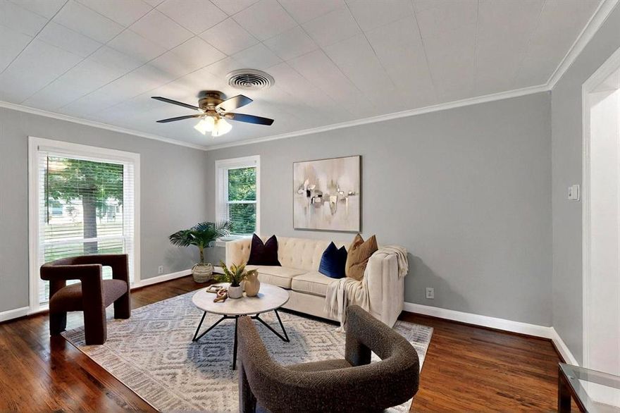 Step into timeless charm with this beautifully remodeled 1946 two-bedroom, one-bath home. The primary bedroom features a versatile en-suite, perfect for an office, reading nook, or nursery. Thoughtfully updated, the home boasts brand-new windows, central heat and air, refinished hardwood floors, and stylish new tile in the kitchen and bath. A modern tankless water heater adds efficiency, while gorgeous light fixtures, ceiling fans, and a new dishwasher elevate the space.  

Outside, a newly paved driveway leads to a stunningly landscaped yard. The expansive backyard is a true retreat, complete with a patio deck, gazebo, and mature trees offering ample shade—ideal for outdoor gatherings or peaceful relaxation.  

This move-in-ready home blends historic charm with modern updates, creating the perfect balance of comfort and character.