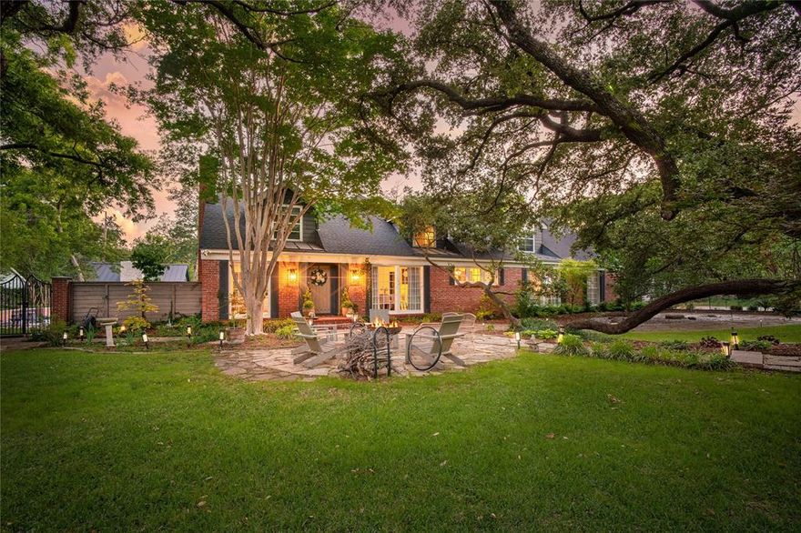 This quintessential Casa Linda Estates residence captures the neighborhood's defining charm and character, situated on a sprawling .55-acre lot with professionally landscaped gardens and mature trees. Two magnificent Live Oak trees serve as the front yard's centerpiece, framing an unassuming red brick colonial-style home enhanced by Japanese Maples and a flagstone patio. Extensive updates completed over the past 15 years include a renovated kitchen, a garage converted into a spacious family room, hardwood flooring and updated lighting throughout most of the home, and an approximately 350 sq ft cabana. Cabana serves as a home office or pool entertaining area offering a kitchenette, full bathroom, and a double-sided fireplace, with a dedicated gardening area located just behind it. Outdoor highlights include a custom pool and a basketball court. Recent mechanical and exterior updates include a roof replacement, tankless hot water heater, updated upstairs windows, wood fence surrounding the property, and 2024 indoor pool equipment. An automatic gate, a four-car carport, and additional side parking make this an ideal setting for multigenerational living. Located in coveted East Dallas just a stone's throw from the Dallas Arboretum and White Rock Lake, minutes from downtown Dallas.