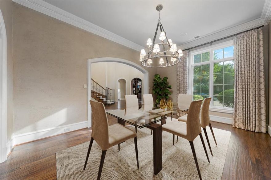 Stunning Hawkins-Welwood traditional in highly sought-after Cambridge Place, offering panoramic golf course views.
This immaculate home is tucked away on a quiet cul-de-sac within an exclusive, gate-guarded community. Showcasing exquisite millwork, rich hardwood floors, and soaring vaulted ceilings, every detail reflects timeless quality. The gourmet kitchen features dual gas ranges, granite countertops, stainless steel appliances, and a breakfast bar, flowing seamlessly into the casual dining area. The home also offers a formal dining room, perfect for entertaining, and a private library ideal for work or relaxation. The expansive primary suite provides a luxurious retreat with dual walk-in closets, separate vanities, a walk-in shower, and a spa-like soaking tub. Upstairs, you’ll find three additional bedrooms plus a private gym. Enjoy peaceful outdoor living on the covered patio below or the balcony above — both overlooking the pristine golf course. New Roof 2025!